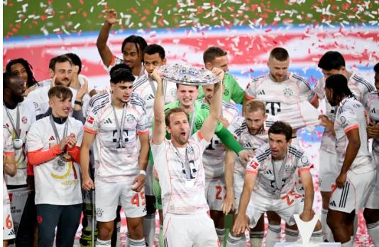 Harry Kane nang cao danh hieu Bundesliga cung Bayern Mumich.